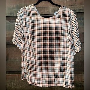 Soft women’s work blouse. Plaid pattern